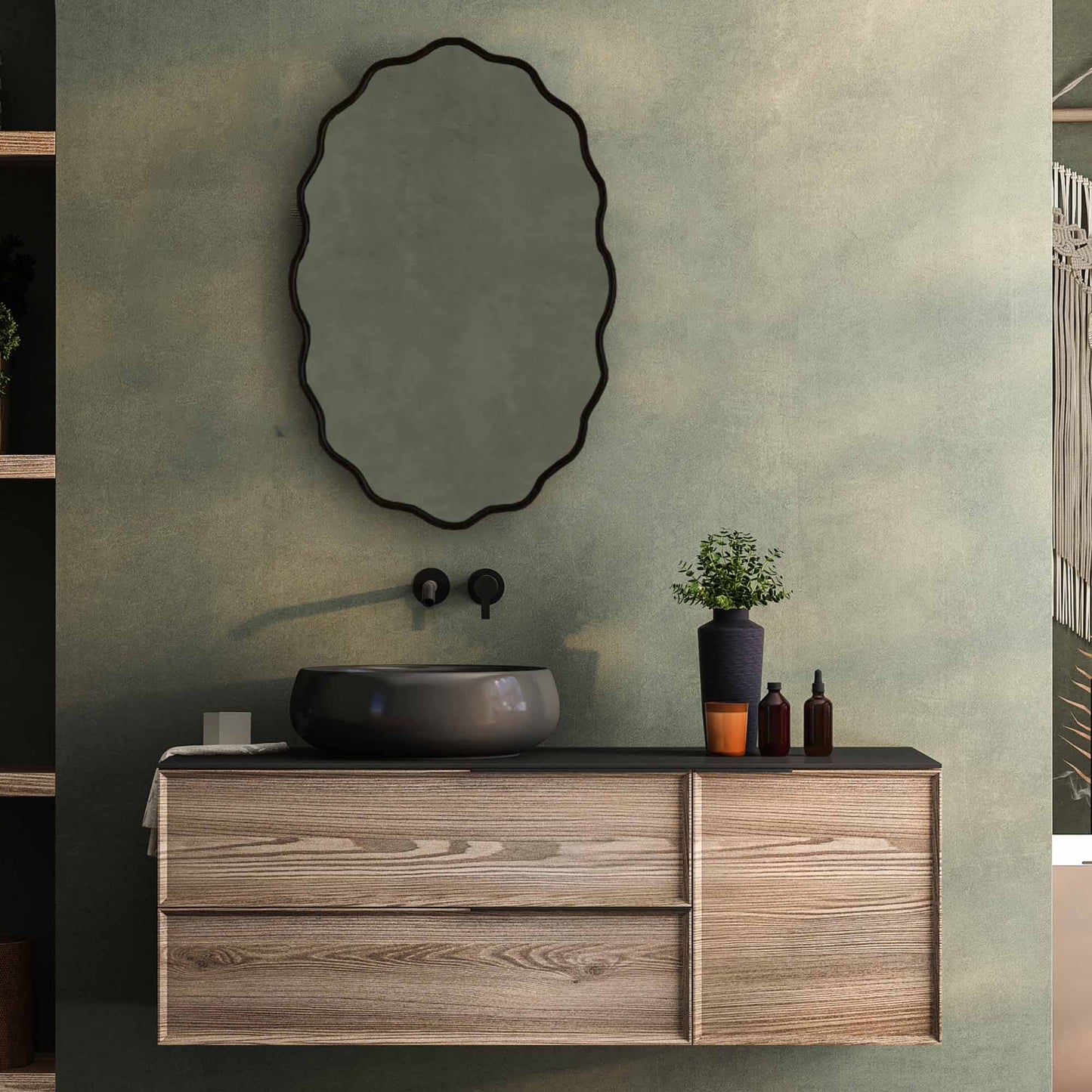black frame Flower Mirror in green wall on bathroom with black sink and black faucet