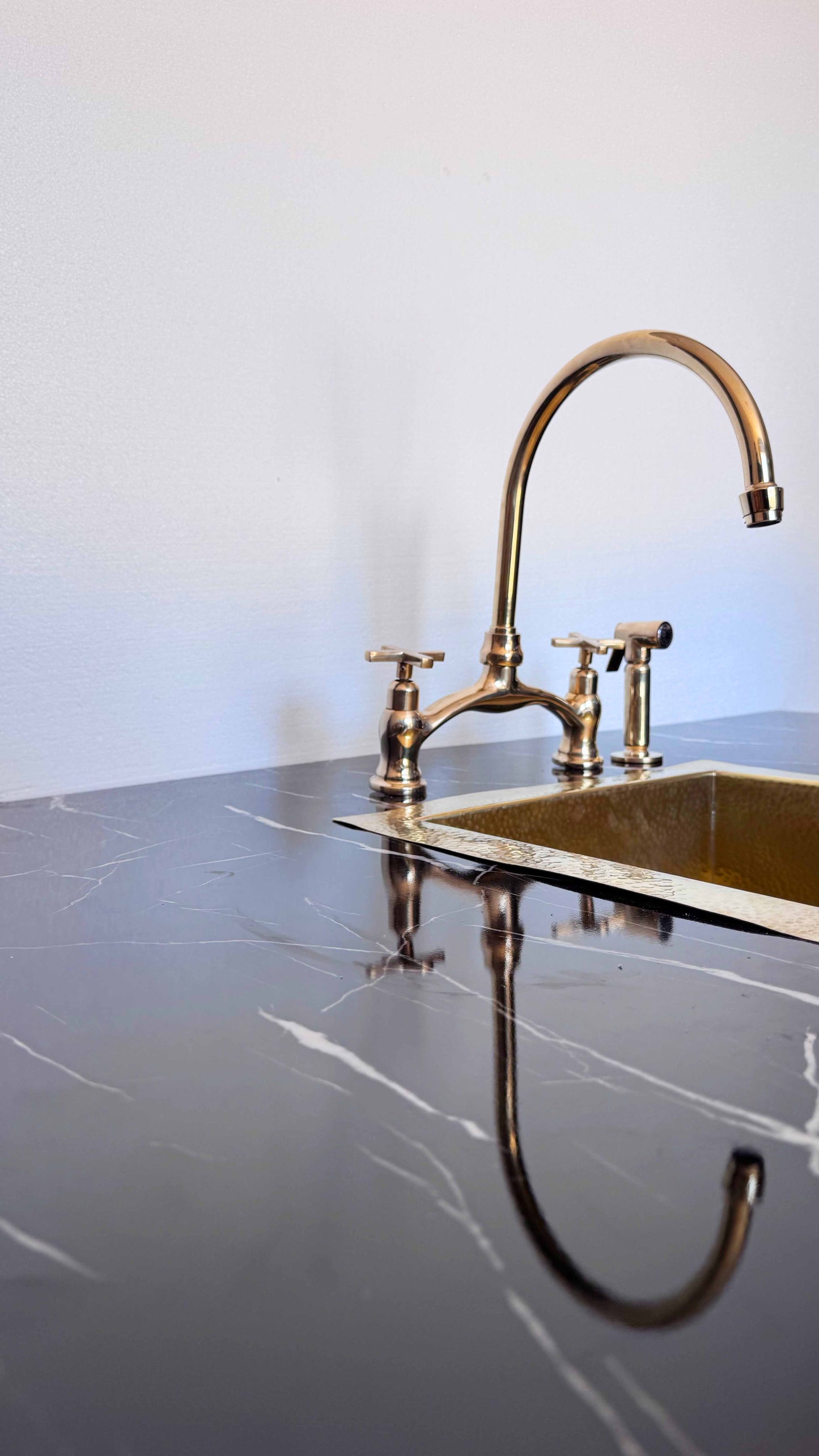 Antique Brass Kitchen Faucet in kitchen