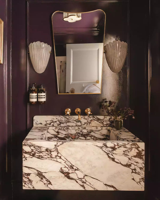 brass mirror in a powder rom