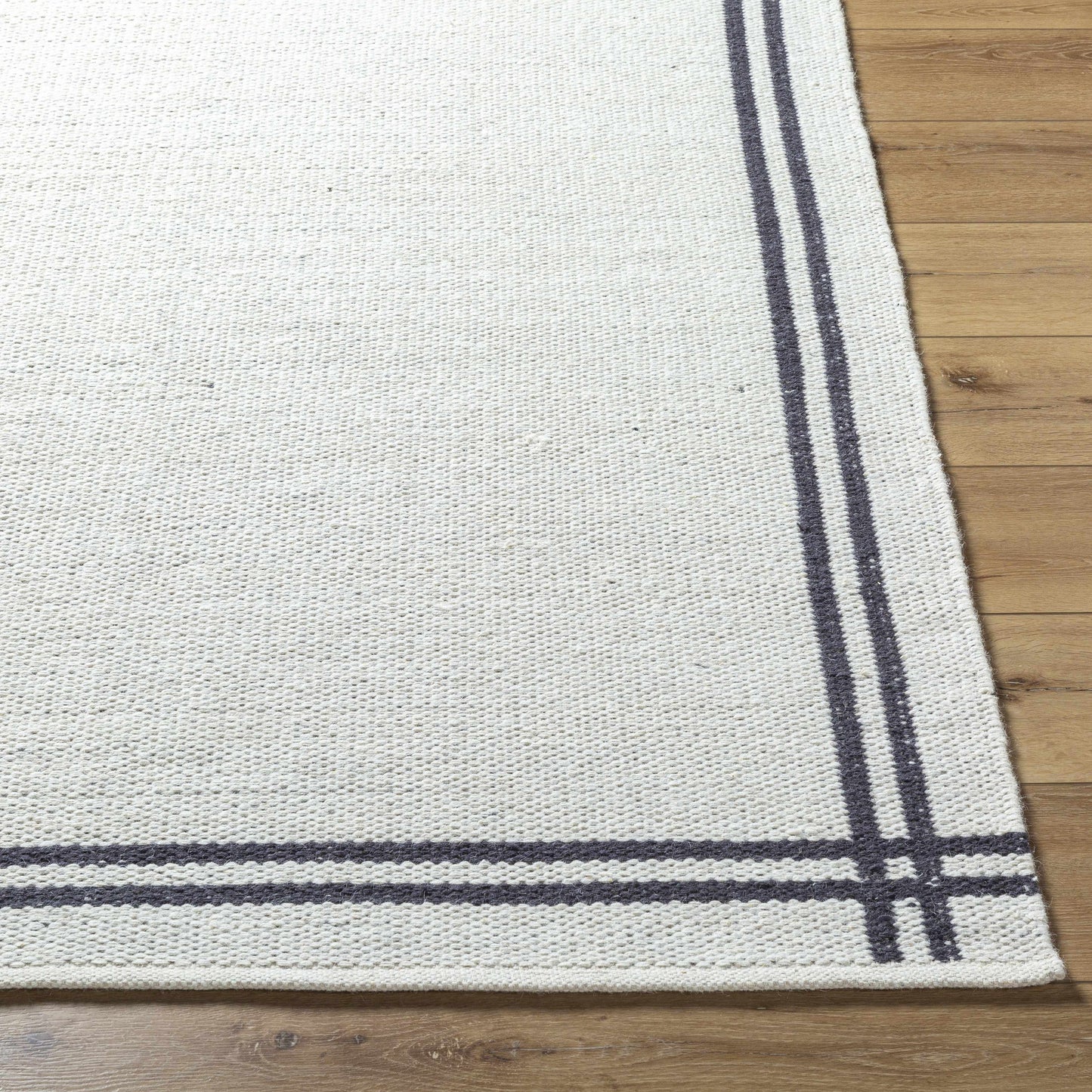 Nimue Wool Area Rug - Elegant Border Design for Cozy Interiors