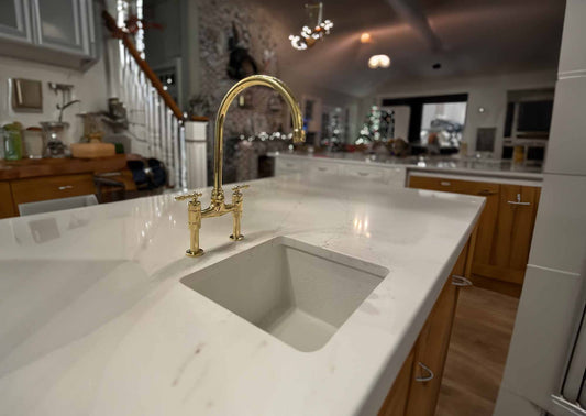 Gold kitchen faucet detail