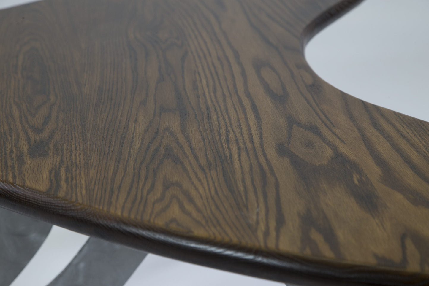 Close-up of a wooden surface with a wenge finish