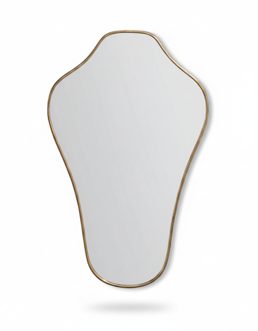 Sculpted crest brass mirror with organic curved frame on white background