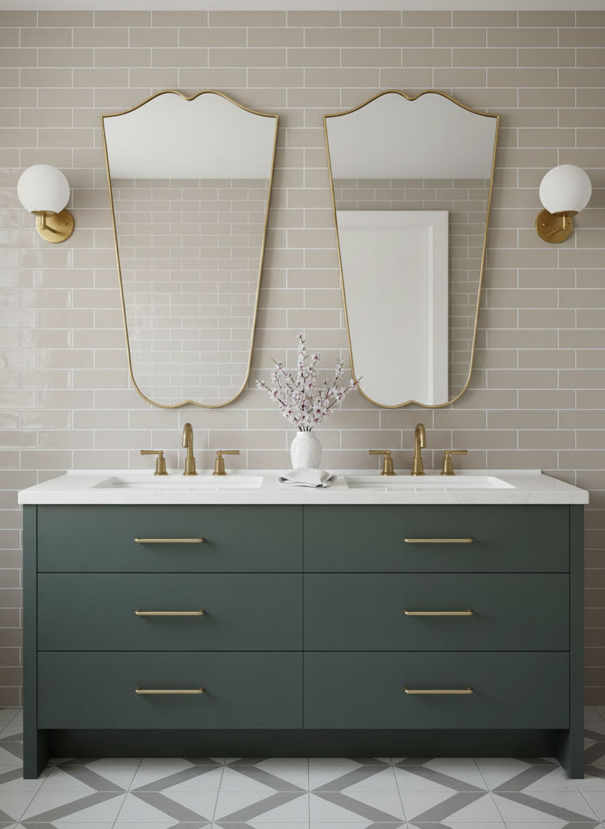 Gentle Wave Crest brass mirror above double bathroom vanity