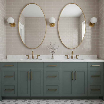 Brass oval mirrors above double bathroom vanity