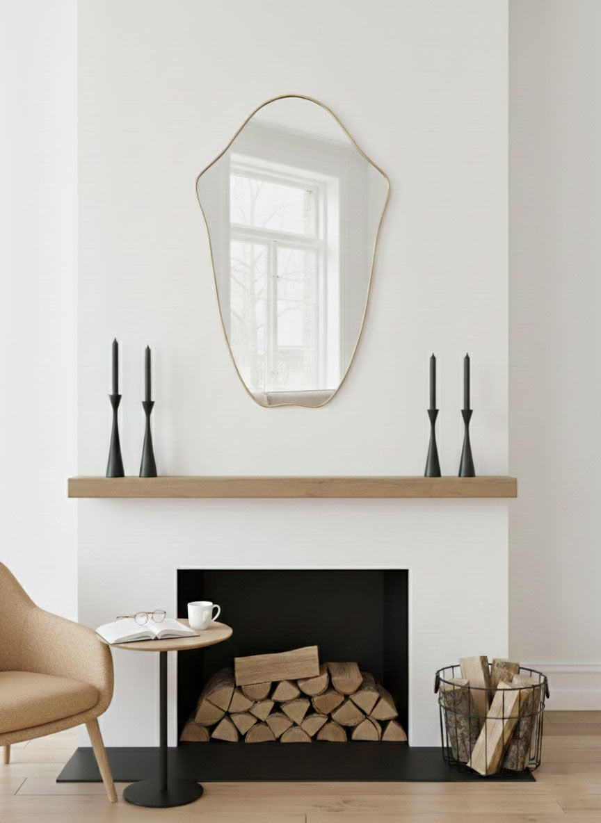 Crest Edge mirror styled above a modern fireplace mantel