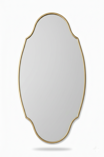 Modern regal oval brass mirror on white background