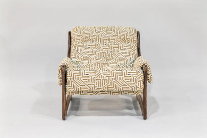 Chair with a patterned beige and brown cover on a white background