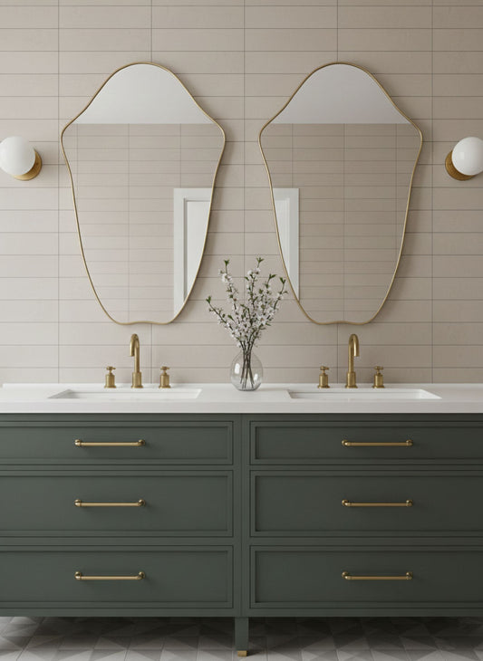 Double Crest Edge brass mirrors above a bathroom vanity