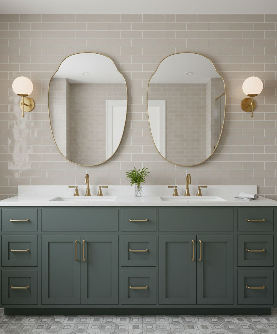 Pair of Pebble Crest brass mirrors over double bathroom vanity