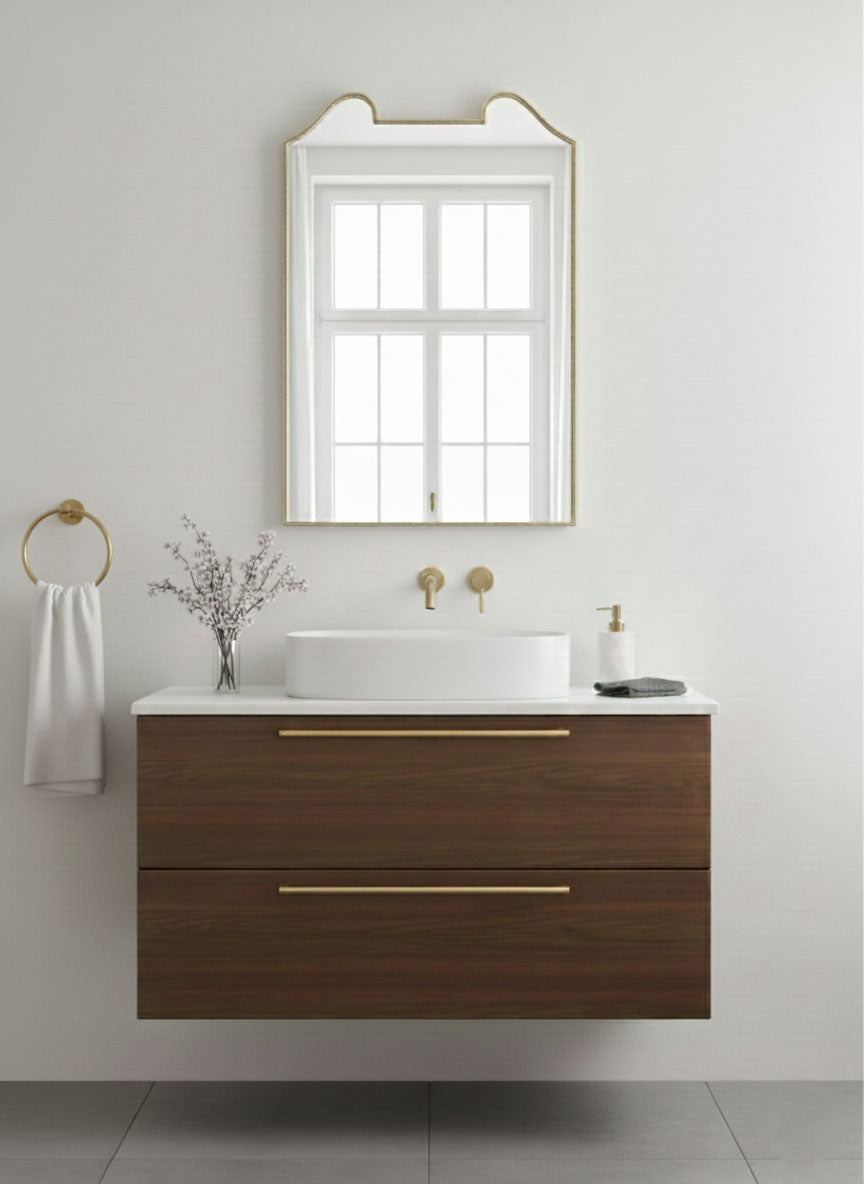 Double arch crest mirror above modern bathroom vanity