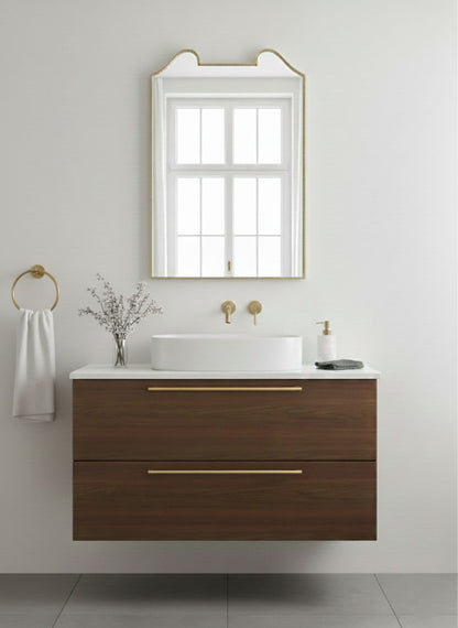 Double arch crest mirror above modern bathroom vanity