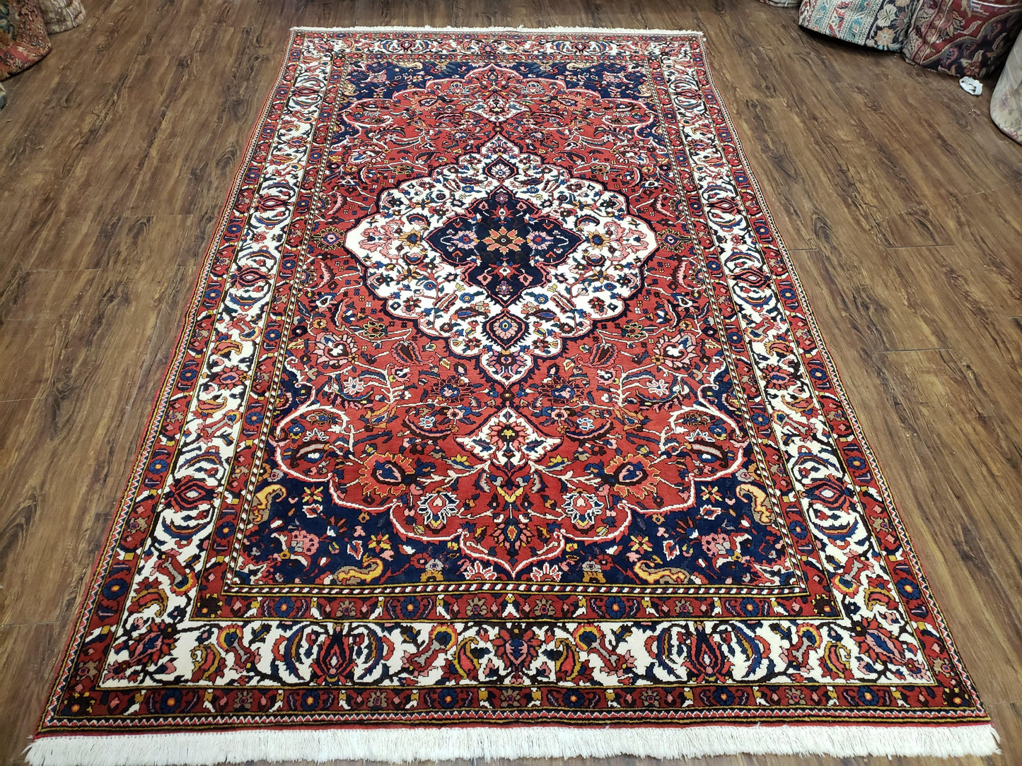 Semi Antique Persian Bakhtiari Rug, Hand-Knotted, Wool, Red, Midnight Blue, Ivory, Floral Medallion, 5'1" x 8' 6"