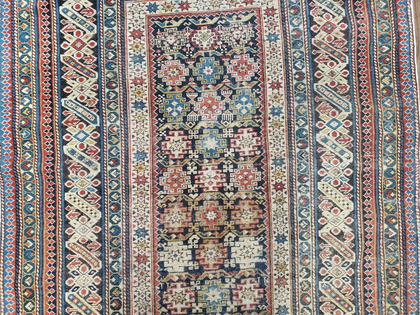 Caucasian Rug Hand Knotted 3 Ft 9 In By 5 Ft 7 In Antique 1920s Chi Chi Carpet Wool Colorful Dark Blue Cream Red