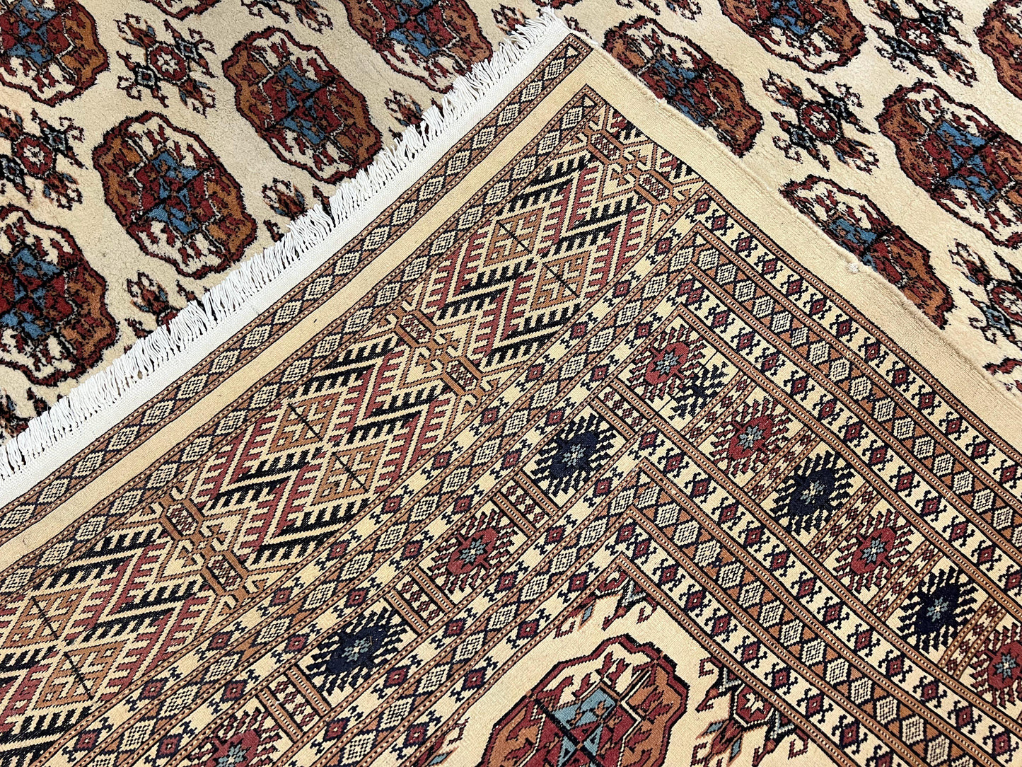 Pakistani Bokhara Rug 8x10, Traditional Turkoman Tribal Carpet, Allover Repeated Elephant Foot Motif, Ivory/Cream Black Red, Vintage Handmade