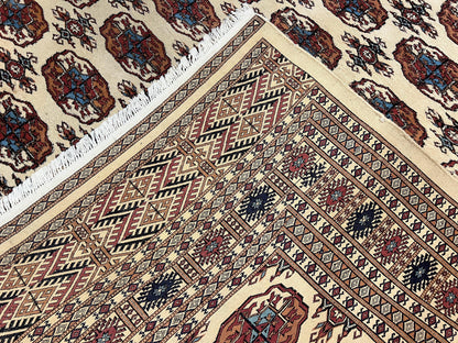 Pakistani Bokhara Rug 8x10, Traditional Turkoman Tribal Carpet, Allover Repeated Elephant Foot Motif, Ivory/Cream Black Red, Vintage Handmade