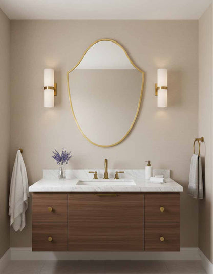 Shield shaped wall mirror