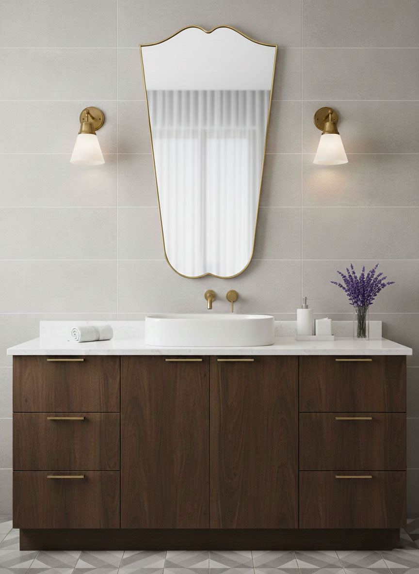 Brass Gentle Wave Crest mirror mounted above modern sink