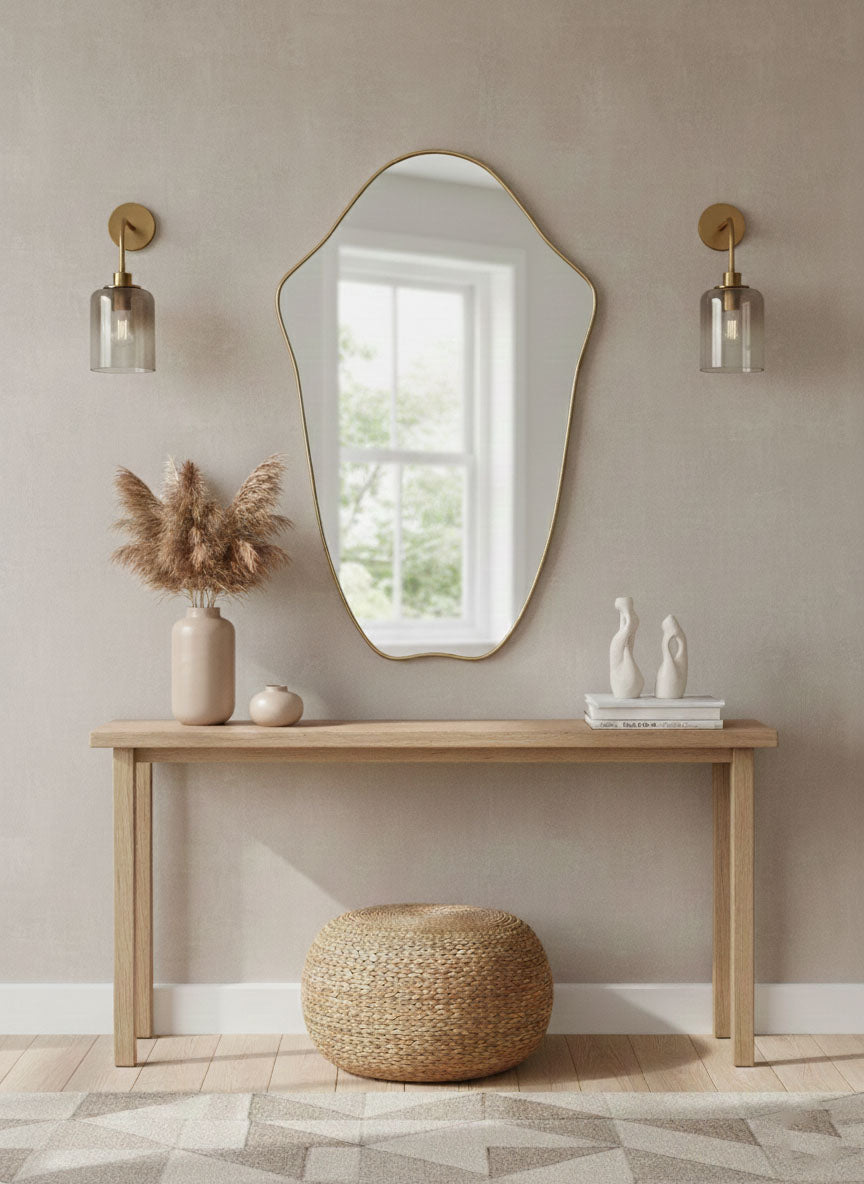 Crest Edge mirror with brass frame in minimalist entryway