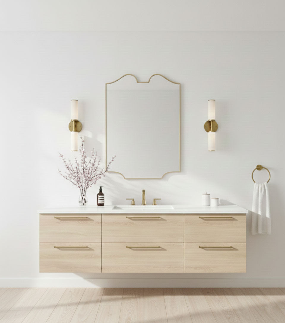 Twin-curve crest brass mirror above modern bathroom vanity