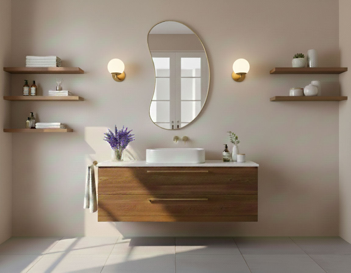 Asymmetrical bean curve mirror in minimalist bathroom setting