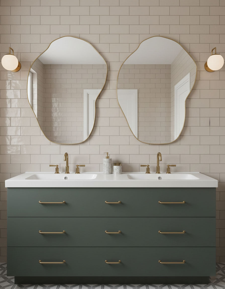 Double pebble-shaped brass mirrors for modern double vanity