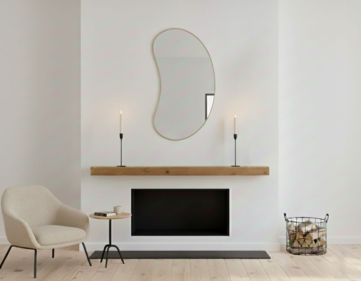 Modern bean curve mirror styled above fireplace mantel