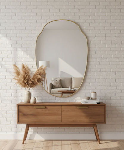 Minimal oval brass mirror