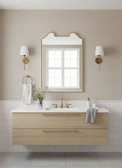 Double arch crest mirror styled in neutral bathroom interior