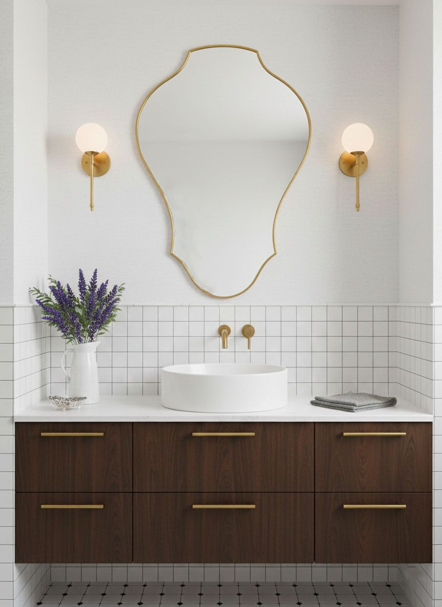 Tulip shield brass vanity mirror in modern bathroom interior