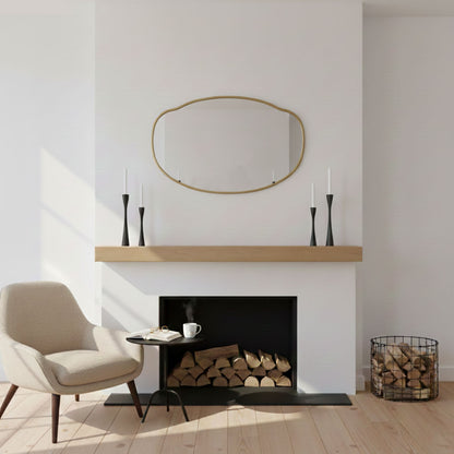 Oval Belle Cloud mirror above fireplace mantel decor
