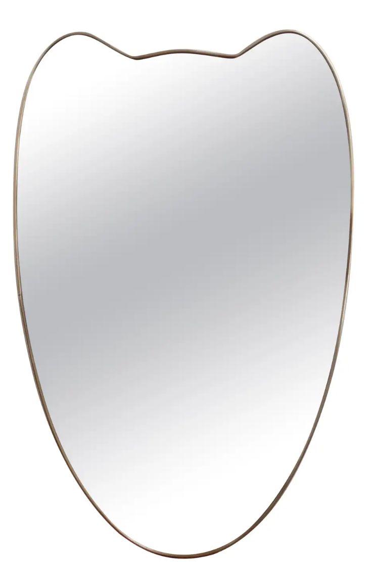 Double-Petal Crest brass mirror isolated on white background