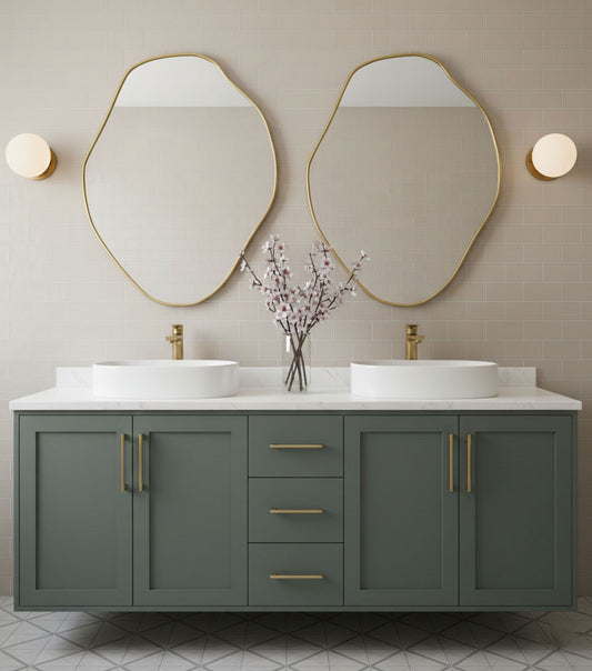 Pair of freeform brass mirrors above double sink vanity in contemporary bathroom