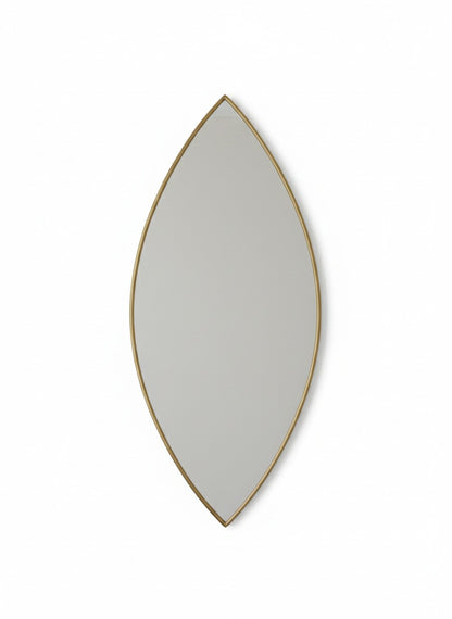 Leaf silhouette brass mirror with slim gold frame on white background