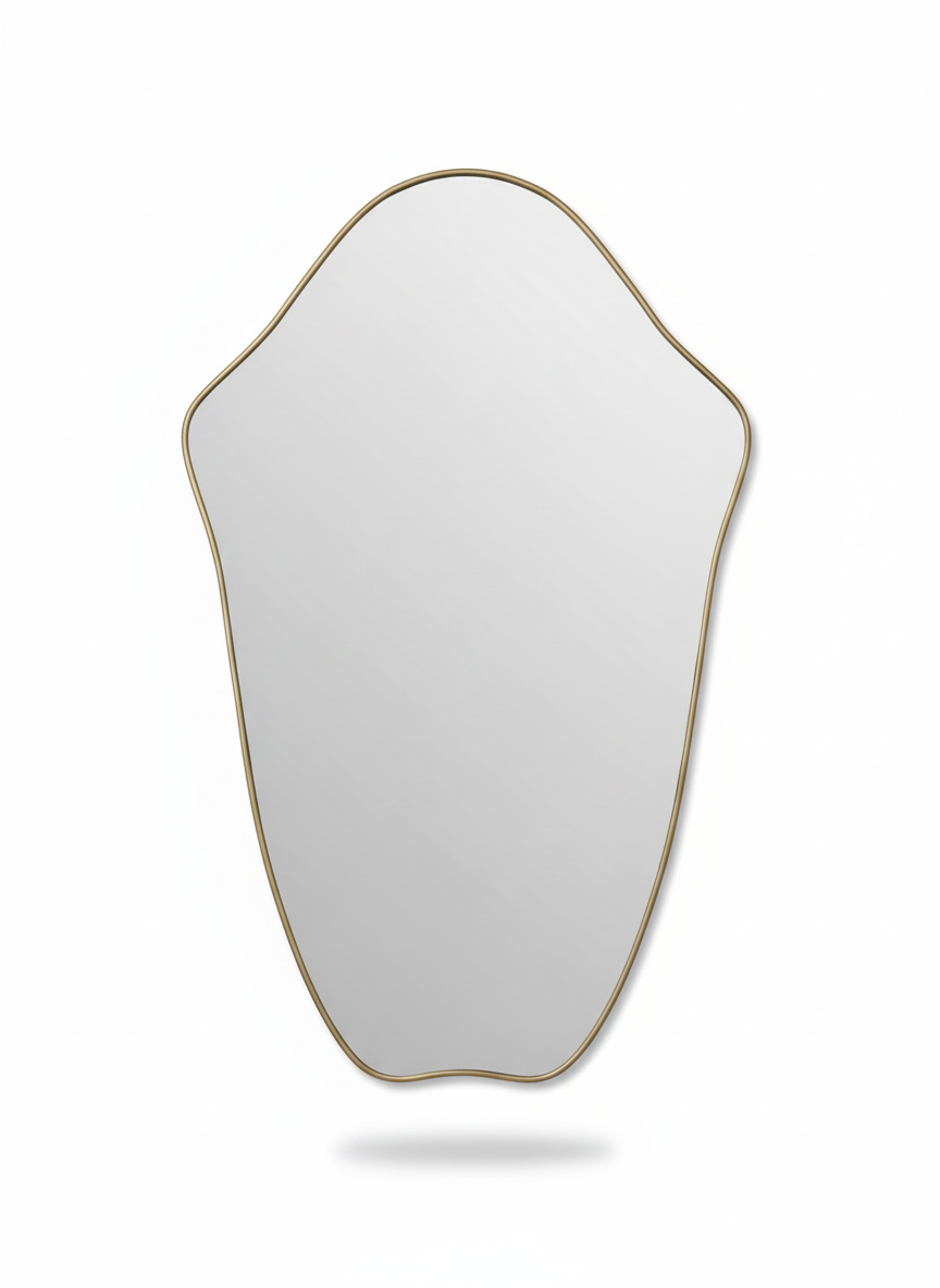 Crest Edge brass mirror with sculpted organic silhouette on white background
