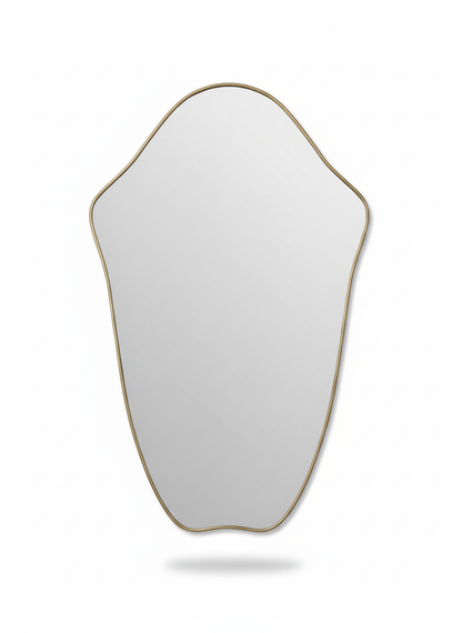 Crest Edge brass mirror with sculpted organic silhouette on white background