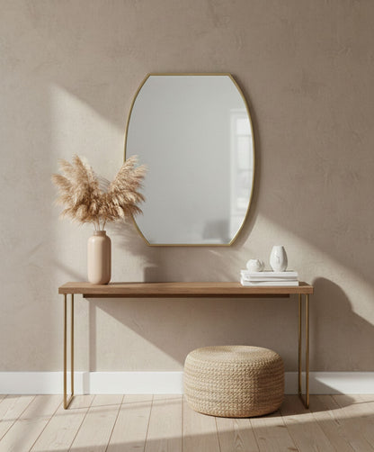 Luxe Contour Rectangle brass mirror styled in a modern entryway