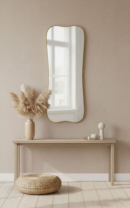 Belle Curve curved rectangle mirror in minimalist entryway