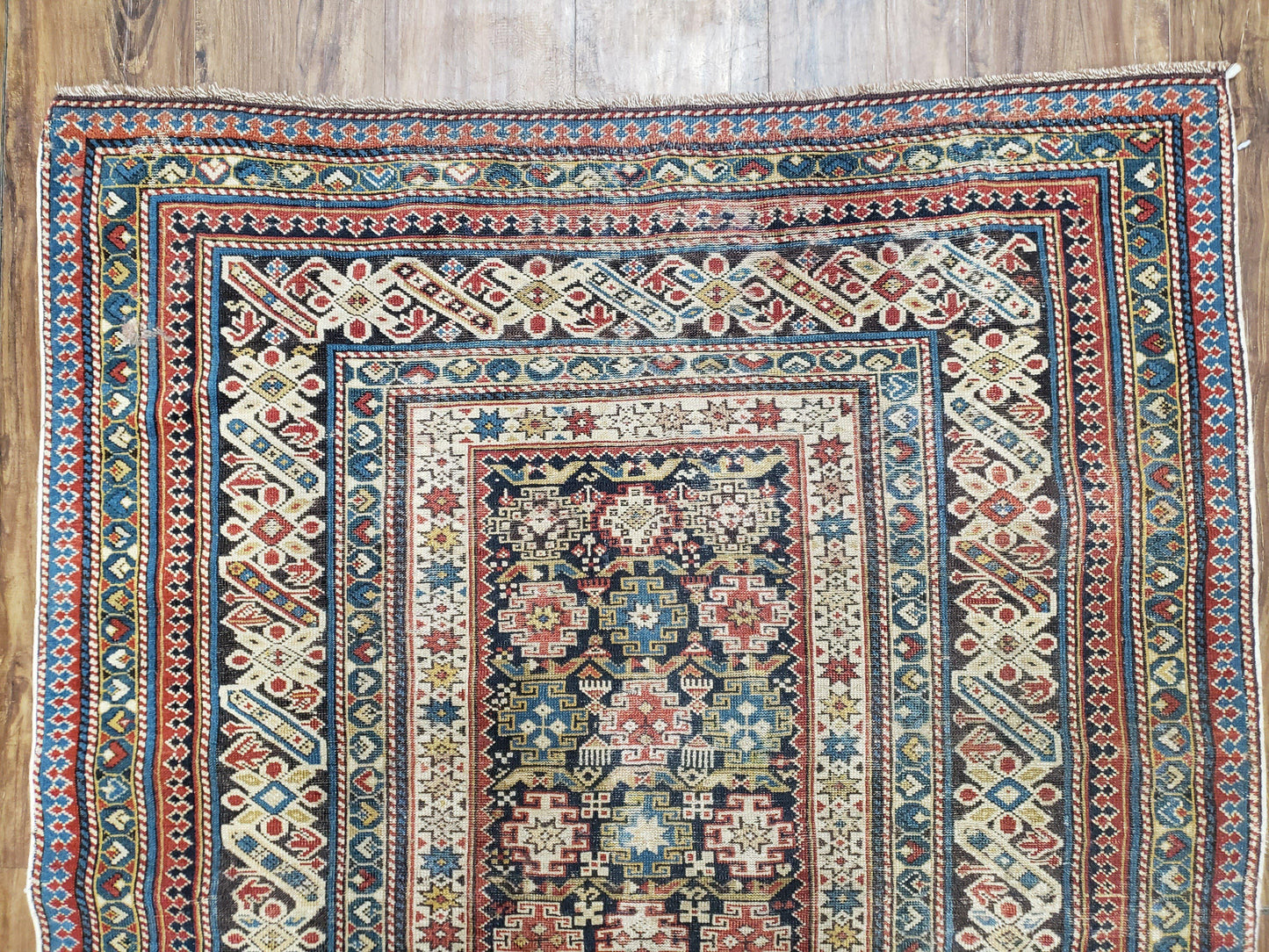 Caucasian Rug Hand Knotted 3 Ft 9 In By 5 Ft 7 In Antique 1920s Chi Chi Carpet Wool Colorful Dark Blue Cream Red