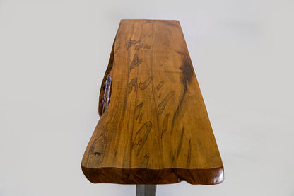 Wooden table top with natural grain and texture on a plain background