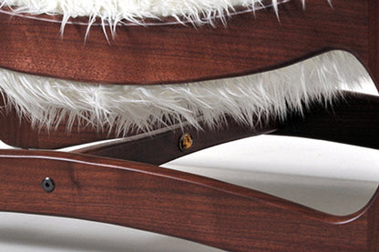 Wooden hanger with white fur on a white background