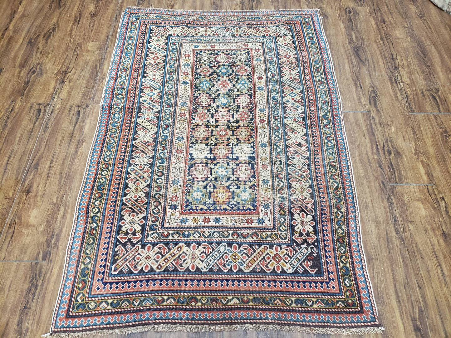 Caucasian Rug Hand Knotted 3 Ft 9 In By 5 Ft 7 In Antique 1920s Chi Chi Carpet Wool Colorful Dark Blue Cream Red