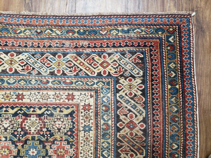 Caucasian Rug Hand Knotted 3 Ft 9 In By 5 Ft 7 In Antique 1920s Chi Chi Carpet Wool Colorful Dark Blue Cream Red