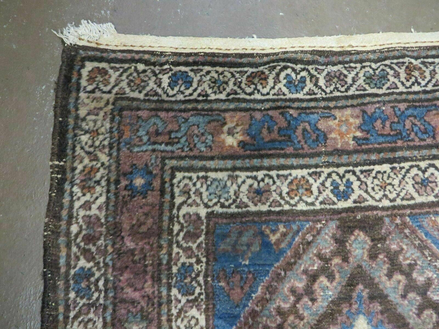 Antique Handmade Wool Rug From India With Floral Oriental Design