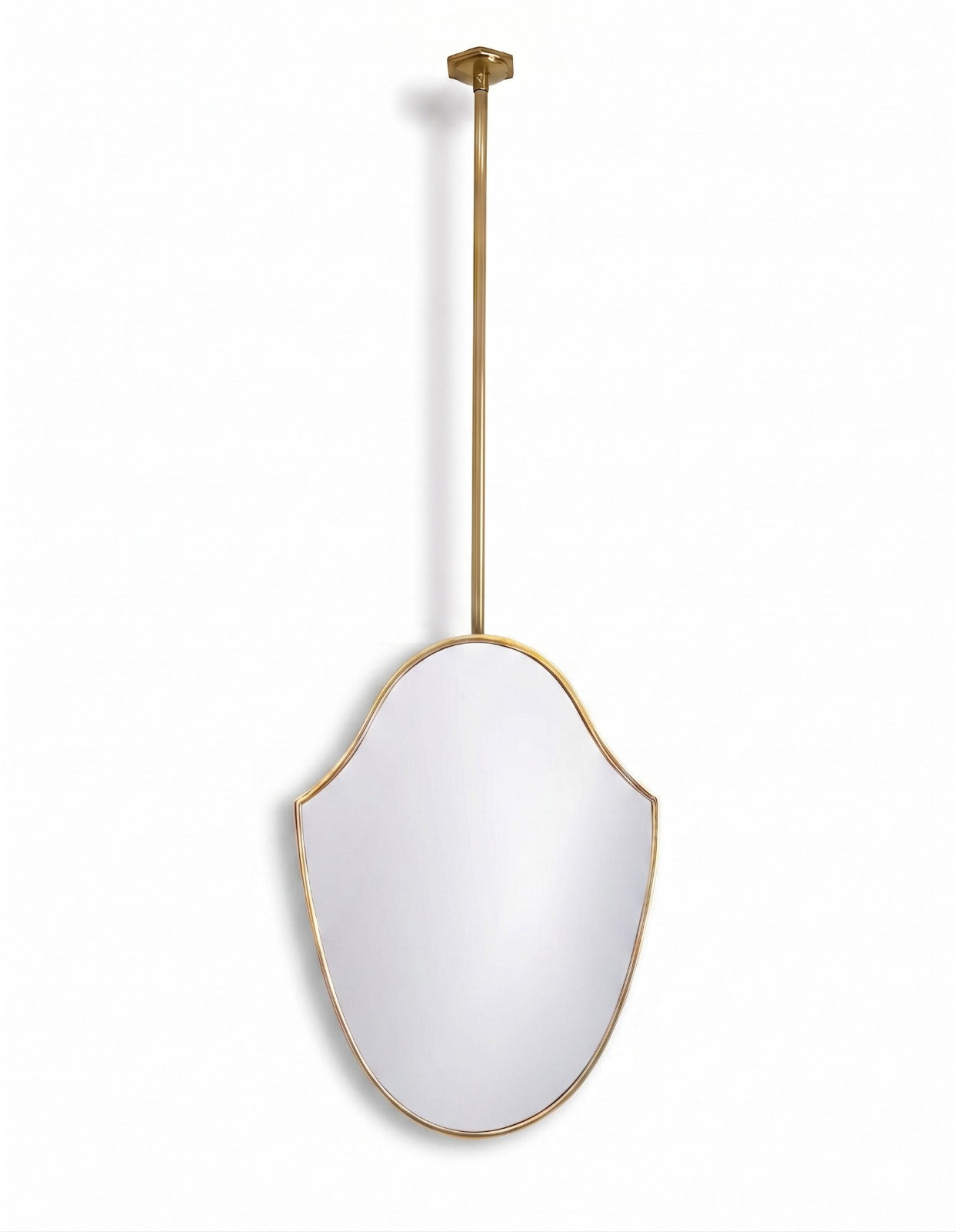 Handmade ceiling-hung shield brass mirror with slim gold frame on a clean white background.