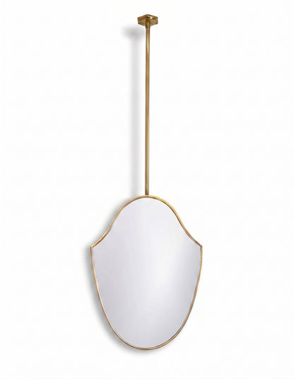 Handmade ceiling-hung shield brass mirror with slim gold frame on a clean white background.