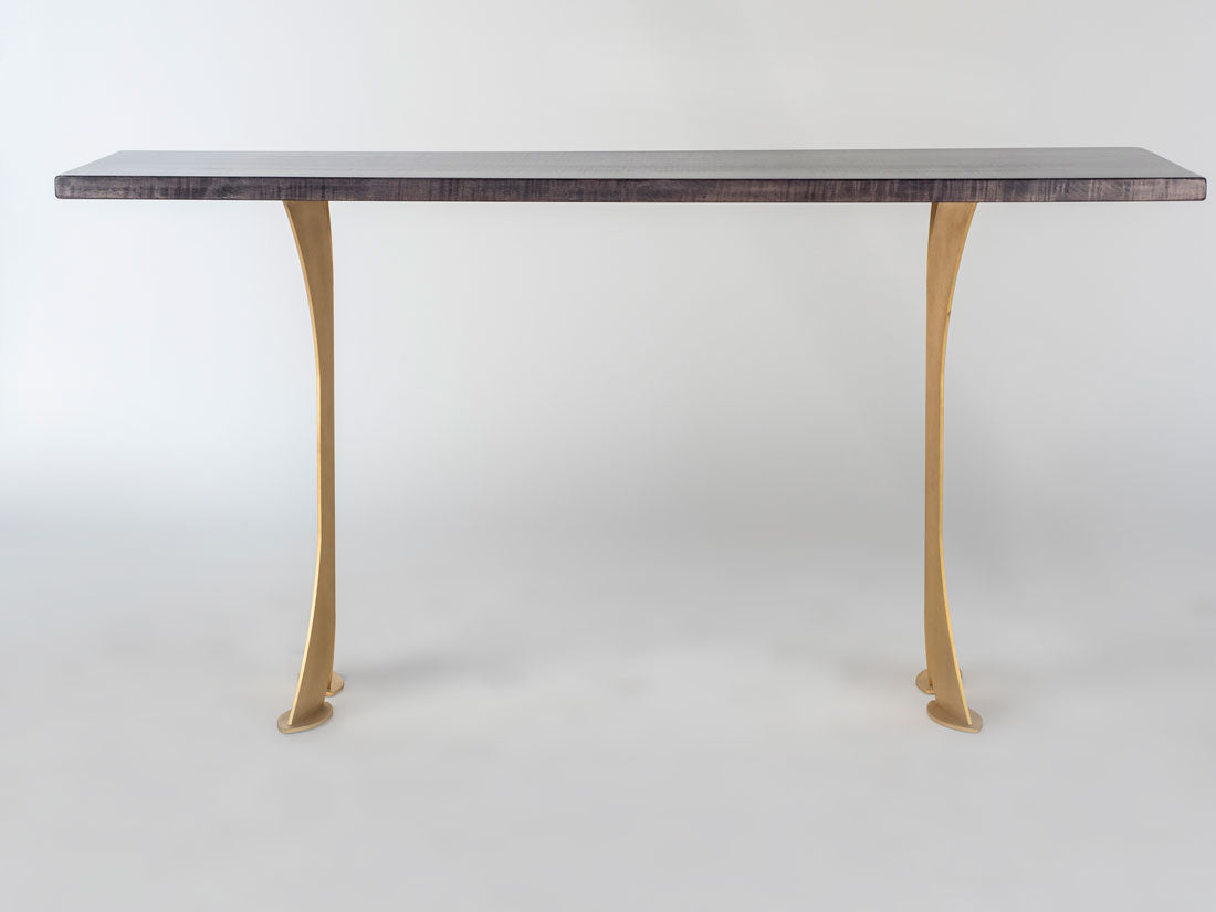 Table with marble top and gold legs on a white background
