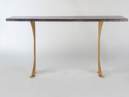 Table with marble top and gold legs on a white background