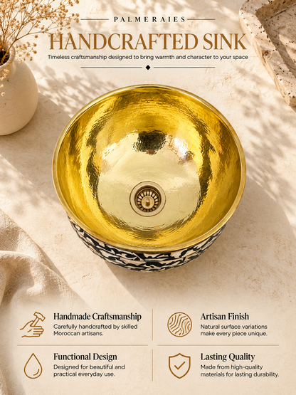 Palmeraies handcrafted sink poster featuring a round basin with a hammered gold interior and black-and-white bone inlay exterior.