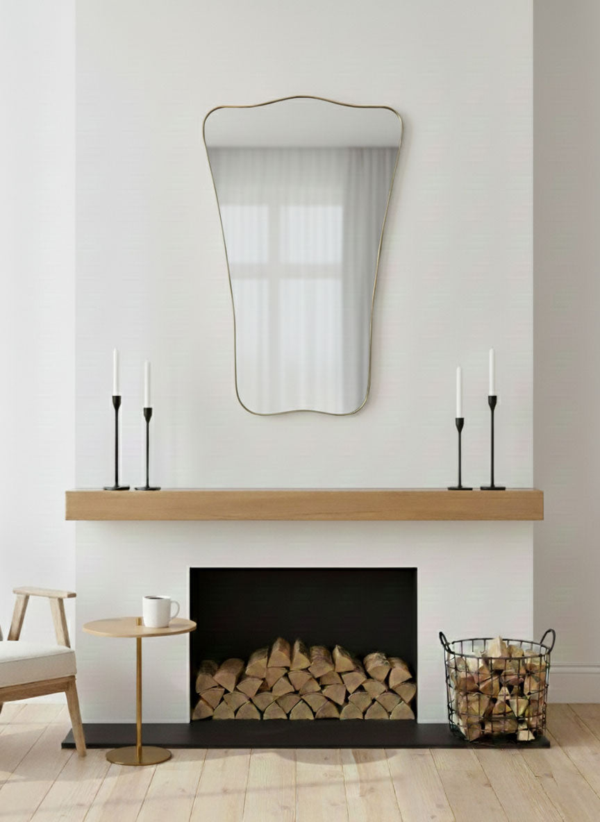 Butterfly wave wall mirror displayed above fireplace mantel